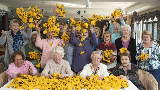 Senior women at Blue Hills Village in Prestons have knitted close to 700 poppies for the Invictus Games. Picture: Matthew Vasilescu