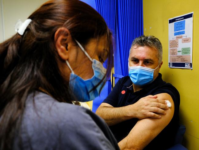 MELBOURNE , AUSTRALIA - NewsWire Photos  MARCH 22: Michael Graham, CEO Victoria Aboriginal Health Services, receiving his COVID19 vaccination at the  (Victorian Aboriginal Health Service) Respiratory Clinic in Fitzroy.Picture: NCA NewsWire/ Luis Ascui