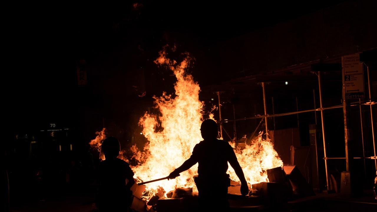 A fire lit during a protest that began in Brooklyn. Picture: Braulio Jatar / SOPA Images / Sipa USA