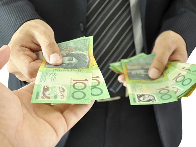 Businessman hand giving money - Australian dollars