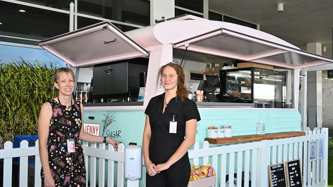 Jade Beattie with Cater Care operations manager Shona Weston at the new Sugar &amp; Cane Cafe located outside of the Arrivals hall at the cairns Domestic airport. Picture Emily Barker.