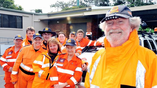 Mr Chapman, pictured right, with the Logan SES crew after they returned from Rockhampton in 2011.