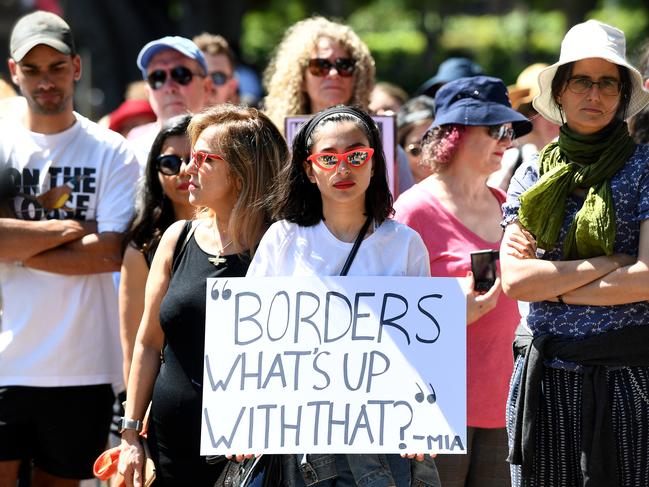 Many protesters held placards at the rally. Picture: AAP Image/Joel Carrett