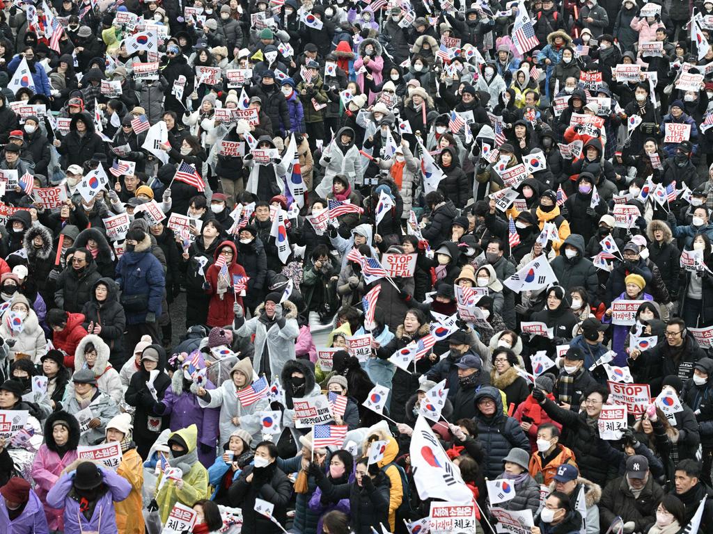 Supporters of Yoon Suk Yeol take part in a rally near his residence in Seoul. Picture: Anthony Wallace/AFP