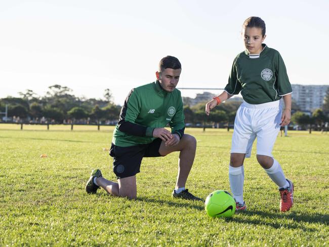 Coogee White Tigers football club have forged a link with European Football giants Celtic FC. Kids training in their Celtic gear, Victoria Di Blasio 9. Image AAP/Matthew Vasilescu