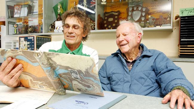 Vic Pascoe enjoys reading Bill Paterson’s athletics scrap book and remembering his remarkable life at the venue named after him. Picture: Claudia Baxter