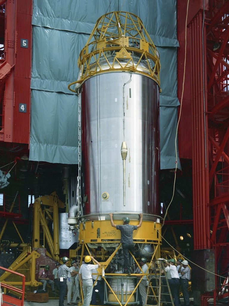 Technicians work on an Atlas Centaur 7 rocket at Cape Canaveral, Florida, US in 1965. Picture: Convair/General Dynamics Astronautics Atlas Negative Collection/San Diego Air and Space Museum via AP