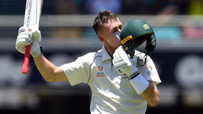 Australia's batsman Marnus Labuschagne celebrates reaching his century on day three of the first Test cricket match between Pakistan and Australia at the Gabba in Brisbane on November 23, 2019. (Photo by Saeed KHAN / AFP) / -- IMAGE RESTRICTED TO EDITORIAL USE - STRICTLY NO COMMERCIAL USE --