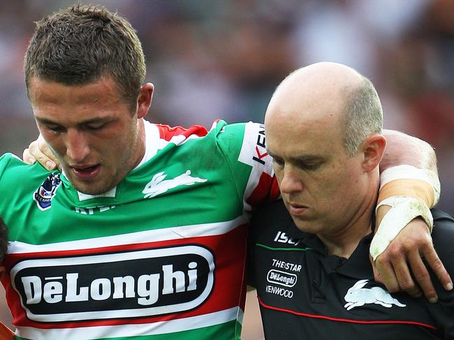 Sam Burgess goes down and then off with a knee injury during Wests Tigers v South Sydney Rabbitohs NRL game at Allianz Stadium in Sydney.