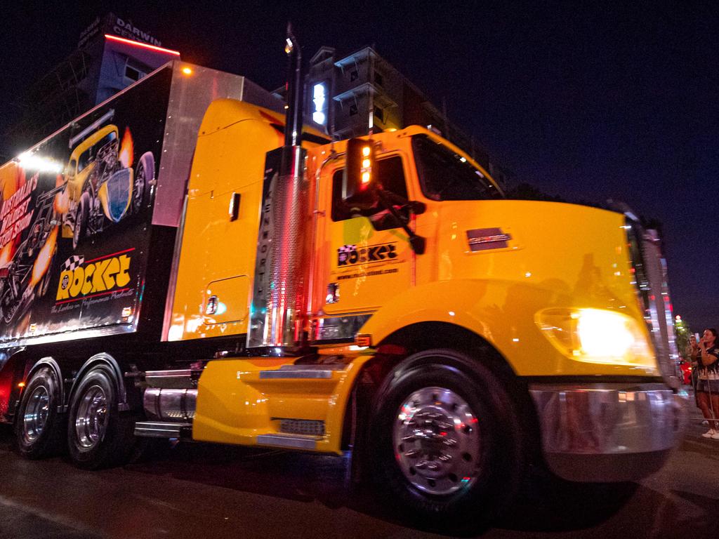 A convoy of trucks arrives in Darwin's CBD to announce the arrival of the Supercars for the round at Hidden Valley Raceway. Picture: Che Chorley