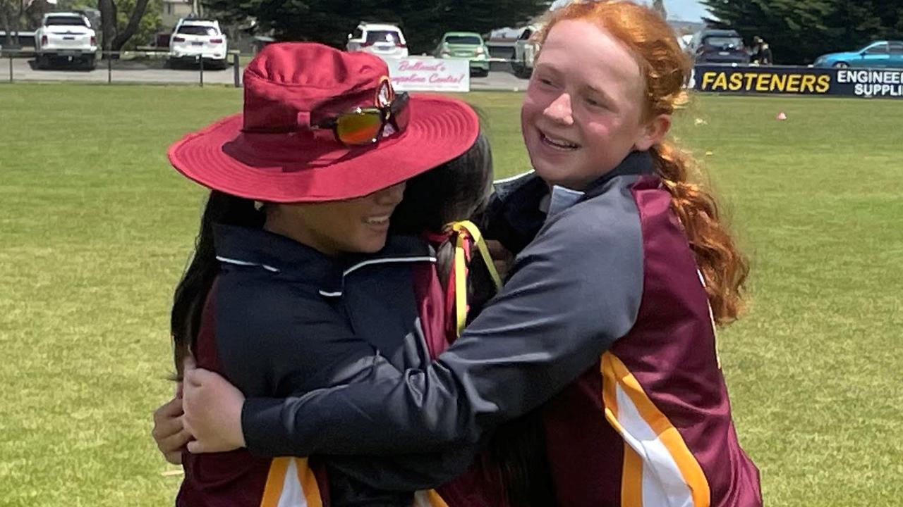 Queensland teammates embrace after winning the School Sports Australia cricket titles in 12 and under girls. Picture: Shane Jones.