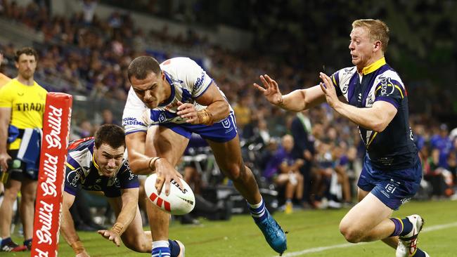 MELBOURNE, AUSTRALIA - MARCH 11: Jacob Kiraz of the Bulldogs scores a try during the round two NRL match between the Melbourne Storm and Canterbury Bulldogs at AAMI Park on March 11, 2023 in Melbourne, Australia. (Photo by Daniel Pockett/Getty Images)