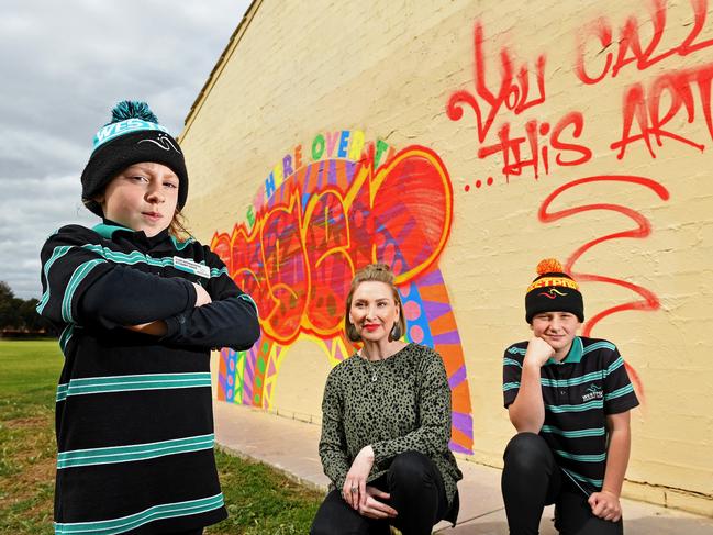 31/08/20 - Westport Primary School students Nell, yer 3, Tully, year 6, are devastated their artwork was graffitied with the words 'You Call This Art' over the weekend.  Pictured with deputy Principal Angela Ratcliffe.Picture: Tom Huntley