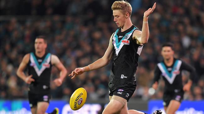 ADELAIDE, AUSTRALIA - JUNE 22: Todd Marshall of the Power kicks the ball during the round 14 AFL match between the Port Adelaide Power and the Melbourne Demons at Adelaide Oval on June 22, 2018 in Adelaide, Australia.  (Photo by Daniel Kalisz/Getty Images)