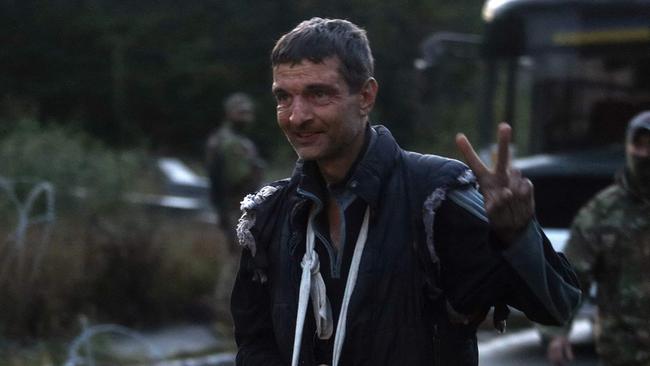 Ukrainian prisoner of war Mykhailo Dianov reacts after a his exchange in Chernigiv region. Picture: Security Service of Ukraine / AFP.