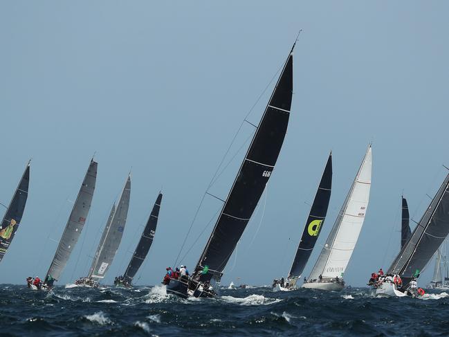 Yachts leave Sydney Harbour during the start of the 2019 Sydney Hobart Yacht Race in Sydney. Picture: Brett Costello