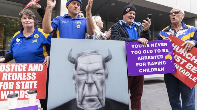 Protesters react after the sentencing for Cardinal George Pell. Picture: Michael Dodge/Getty