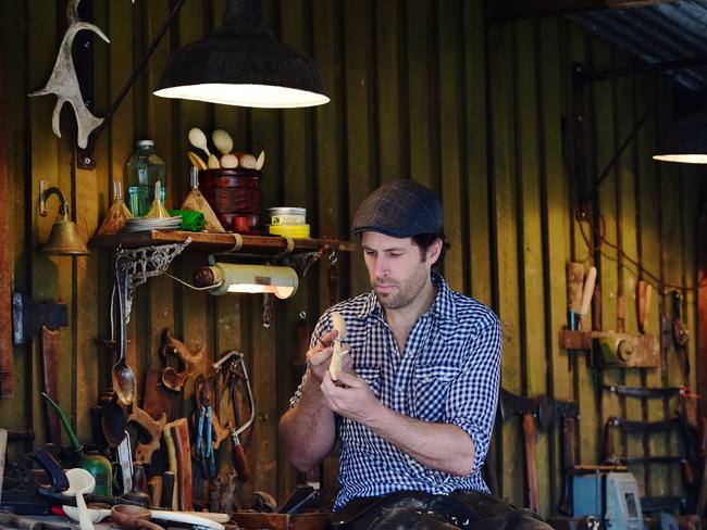 Peter Trott inside his workshop where he makes spoons. Picture: Zoe Phillips