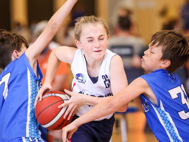 SPORT ADVSA Junior Country Basketball Championships from St Clair Recreation centre, WoodvilleGreat SouthernÃ¢â¬â¢s  Riley Clifford brass throught Eastern Hills Lenny Wheatley.  IMAGE/Russell Millard