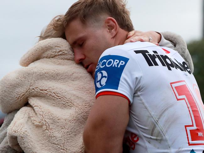 SYDNEY, AUSTRALIA - MAY 29: St George Illawarra Dragons player Jack De Belin reacts with his family after the NSWRL round 12 match against the Western Suburbs Magpies at Lidcombe Oval on May 29, 2021 in Sydney, Australia. De Belin is returning to the Rugby League after being stood down by the NRL under their "no-fault' rule whilst on trial for alleged crimes of which he has now been cleared. (Photo by Jeremy Ng/Getty Images)