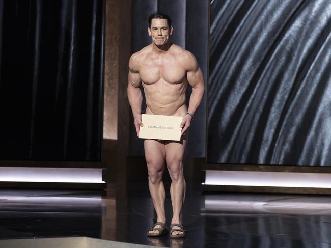 John Cena appears “naked” on stage to present the Oscar for costume design. Picture: Frank Micelotta/Disney/Getty Images