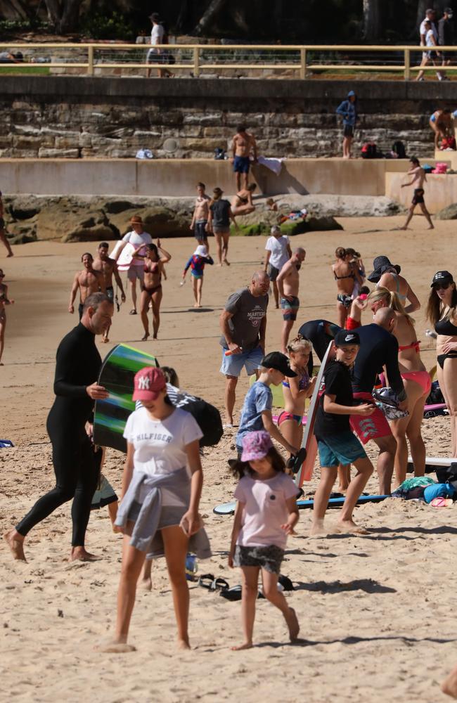 Many beachgoers appeared to show no regard for the 1.5m distancing rule. Picture: Matrix