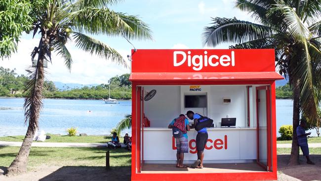 Customers at a Digicel store in Fiji.