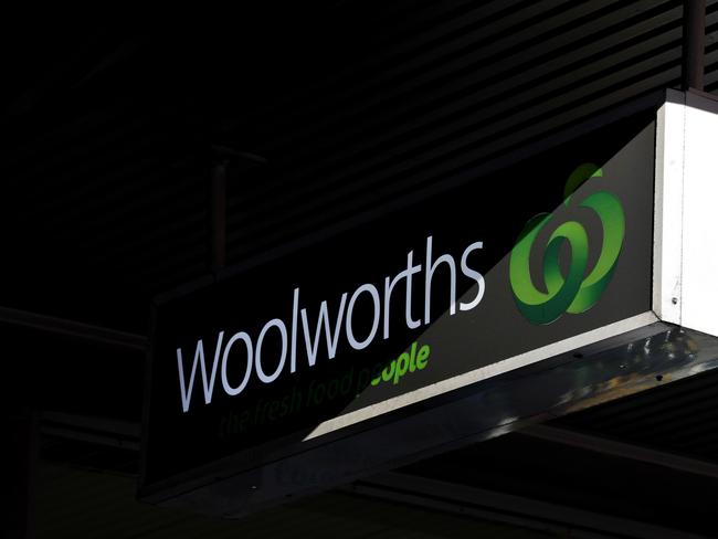 Woolworths supermarket signage at a store in Sydney, Friday, July 29, 2016. Struggling supermarket giant Woolworths is axing 500 office and supply jobs and will shut underperfoming stores as it seeks to improve performance and win back customers lost to rivals Coles and Aldi. (AAP Image/Joel Carrett) NO ARCHIVING