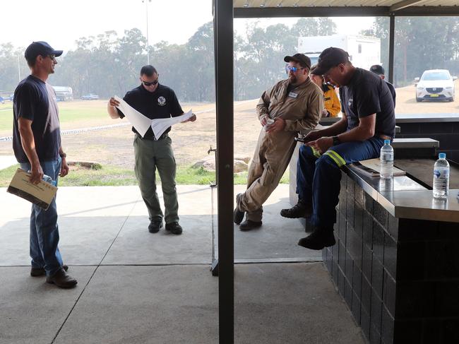 Pilots get their briefing for the day each morning at the Warimoo Oval. Picture: Richard Dobson