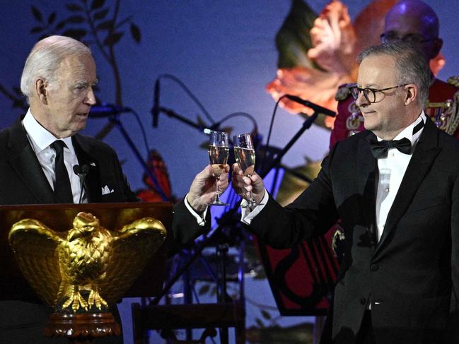 TOPSHOT - US President Joe Biden (L) and Australia's Prime Minister Anthony Albanese toast during a State Dinner at the South Lawn of White House in Washington, DC on October 25, 2023. (Photo by Brendan SMIALOWSKI / AFP)