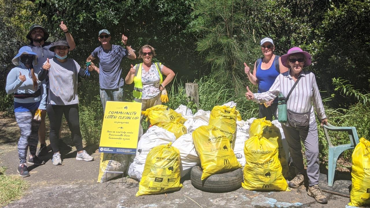 A group of residents helped clean debris and litter on the Parramatta River foreshore. Picture: Kellie Darley