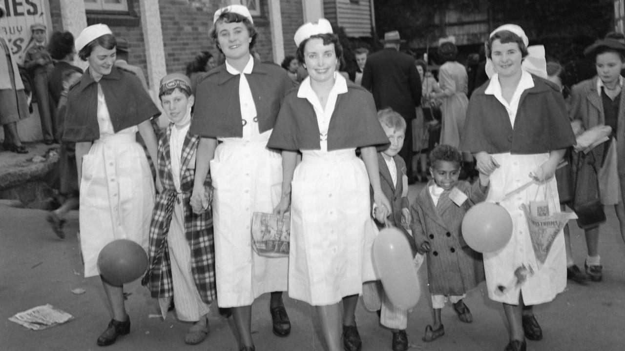 Nurses take young patients to the Show, 1950. Note the boy still in his PJs.