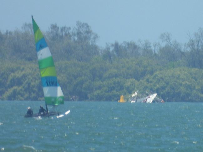 The capsized boat seen on Moreton Bay on Thursday. Picture: Lyndon Mechielsen