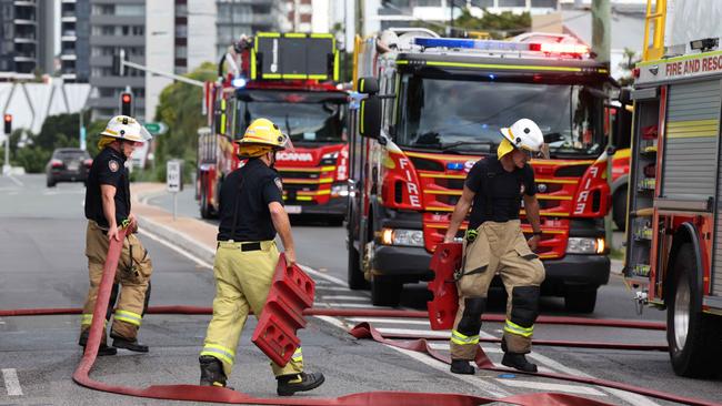 Firefighters at the scene of a house fire on Nudgee Road in Ascot. Picture: Peter Wallis