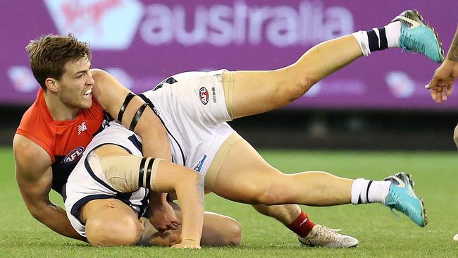 Jack Viney tackles Gary Ablett to the ground. Picture: Michael Klein