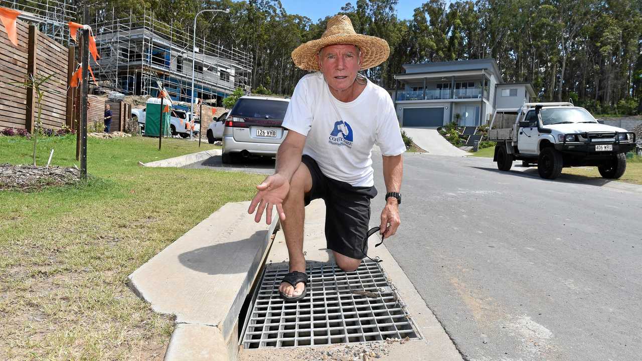 STUNNED: Tony Isaacson had been landscaping a place there when the torrential rains destroyed the yard with mud sent flooding through the site. Picture: Warren Lynam