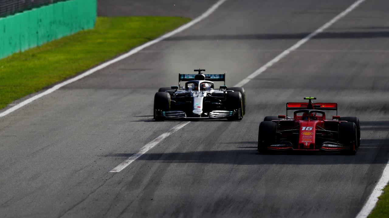 Charles Leclerc leads Lewis Hamilton during the race in Monza.
