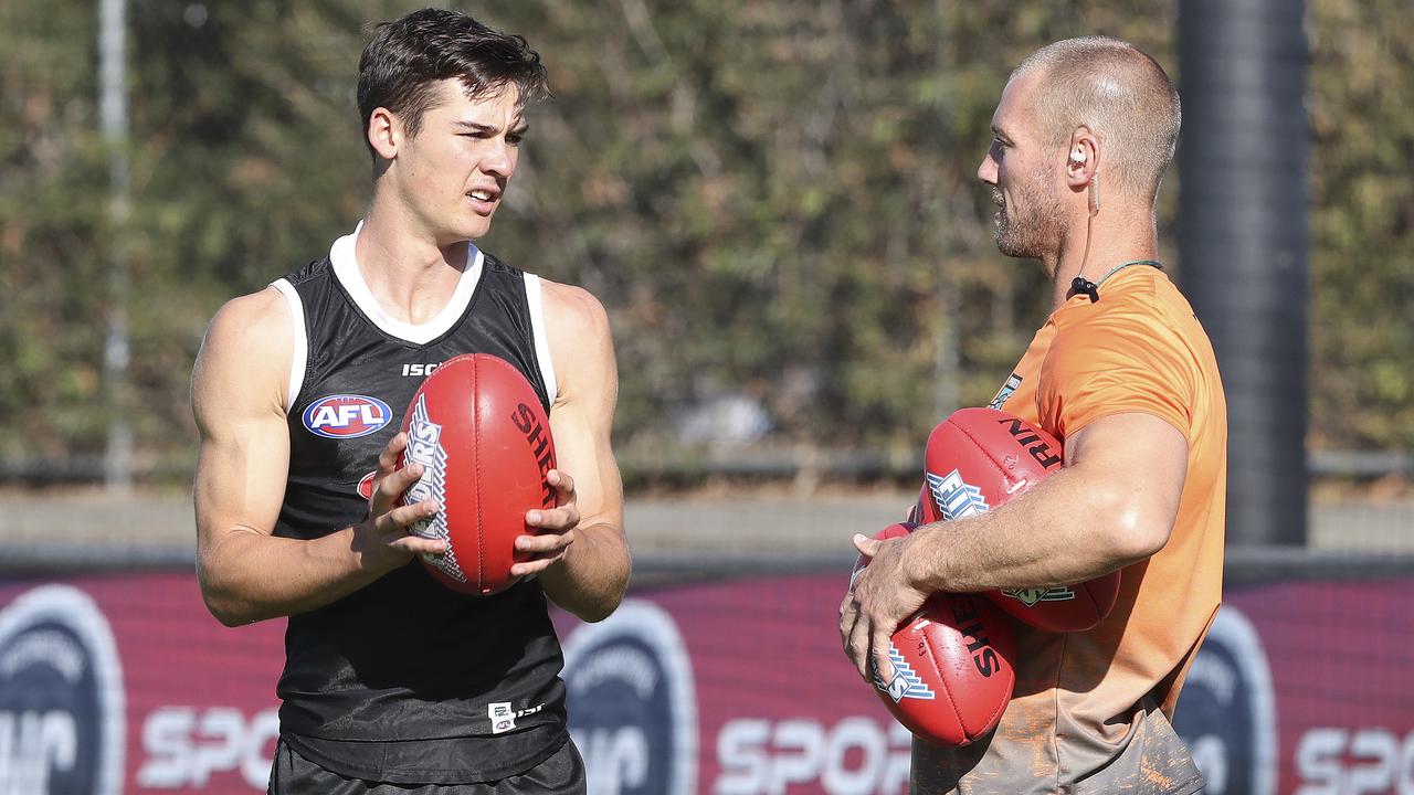 Connor Rozee talks to Scott Thompson at Port Adelaide training. Picture: Sarah Reed