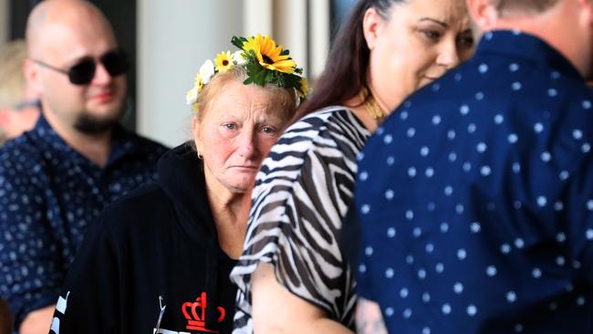 Zac Jones’s mum Debbie wears sunflowers in her hair at the funeral. Pics Adam Head