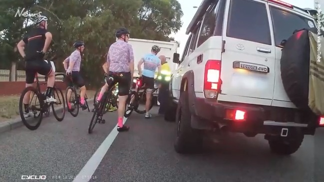 Truck driver confronts cyclists.