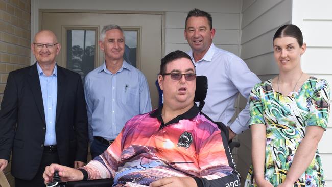 Member for Blair Shayne Neumann, Endeavour Foundation interim CEO David Blower, Disability Services Minister Craig Crawford, and Endeavour Foundation's Darrin Simpson and Grace Hegarty at the unveiling of the two new homes at Yamanto on Wednesday. Picture: Jessica Baker