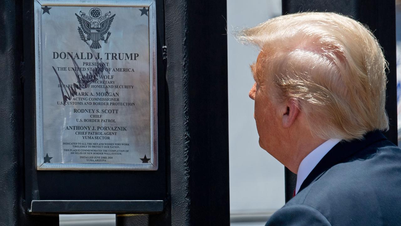 He signed it. Picture: Saul Loeb/AFP