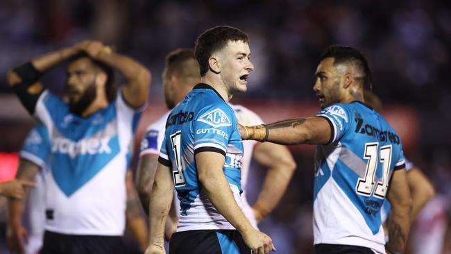 Kade Dykes celebrates victory with team mates after the round 21 NRL match between the Cronulla Sharks and the St George Illawarra Dragons.