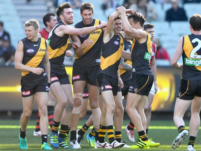 Oleg Markov celebrates his first goal in senior footy.