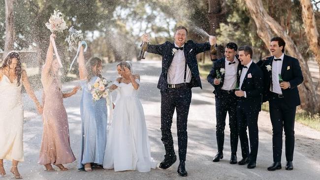 Strachan celebrates his wedding to Suzie Cockroft with Darcy Fogarty among the groomsmen. Picture: Instagram / @kieran_strachan