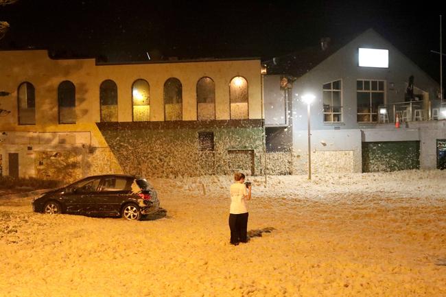 Sea foam up in front of The beach Club at Collaroy. Picture: Damian Shaw