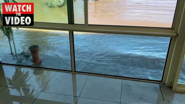 Flood waters lapping at a prawn farm on the Clarence River