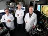 27/05/2020. Scientists Bill Corcoran , David Moss and Arnon Mitchell in the lab at RMIT where they worked on the experiment that broke the internet speed world record this week. 
Picture: David Geraghty / The Australian.