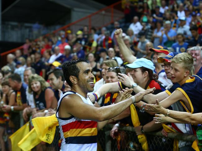 DARWIN, AUSTRALIA - JULY 15:  Eddie Betts of the Crows celebrates with fans after the Crows defeated the Demons during the round 17 AFL match between the Melbourne Demons and the Adelaide Crows at TIO Stadium on July 15, 2017 in Darwin, Australia.  (Photo by Robert Cianflone/Getty Images)