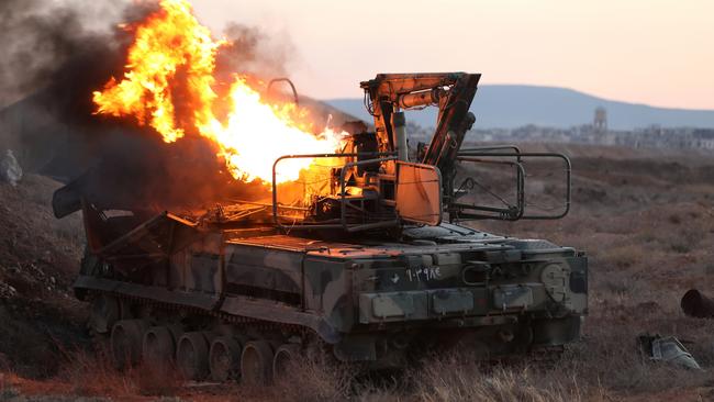 Rebel forces in Syria have retaken the capital from longtime ruler Bashar al-Assad, who was reported to have fled the country. Picture: Ali Haj Suleiman/Getty Images